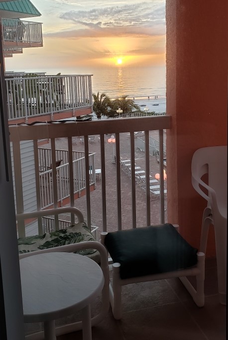 balcony-view-pool-and-sunset-1