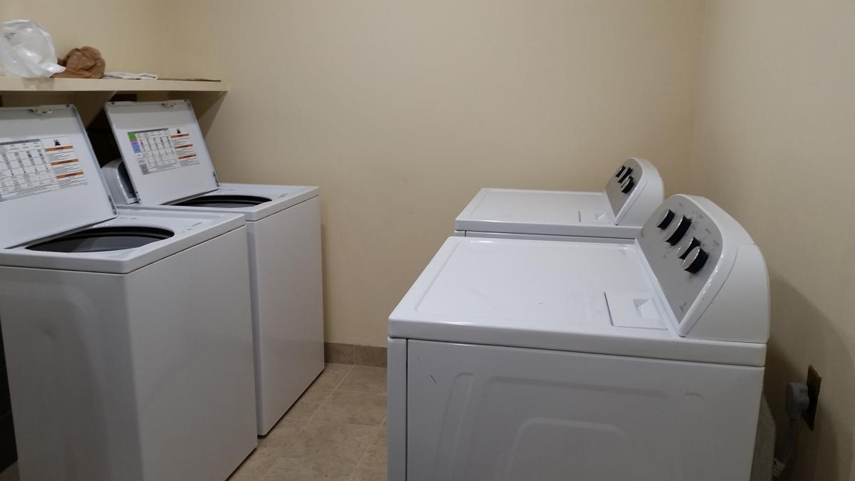 one-of-two-laundry-rooms-on-the-same-floor-as-condo